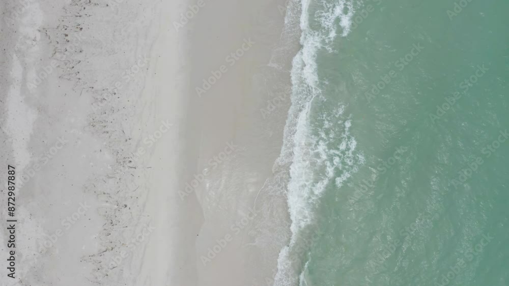 Aerial view of clear blue turquoise seawater, Andaman sea in Phuket island in summer season, Thailand. Water in ocean pattern texture wallpaper background. Aerial view of clear blue turquoise seawater, Andaman sea in Phuket island in summer season, Thailand. Water in ocean pattern texture wallpaper background.