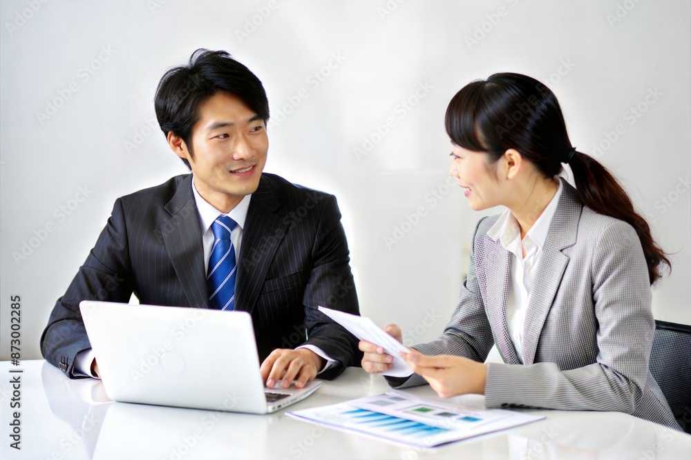 Asian Business Consultant Explaining Financial Solutions
Asian Business Consultant Explaining Financial Solutions