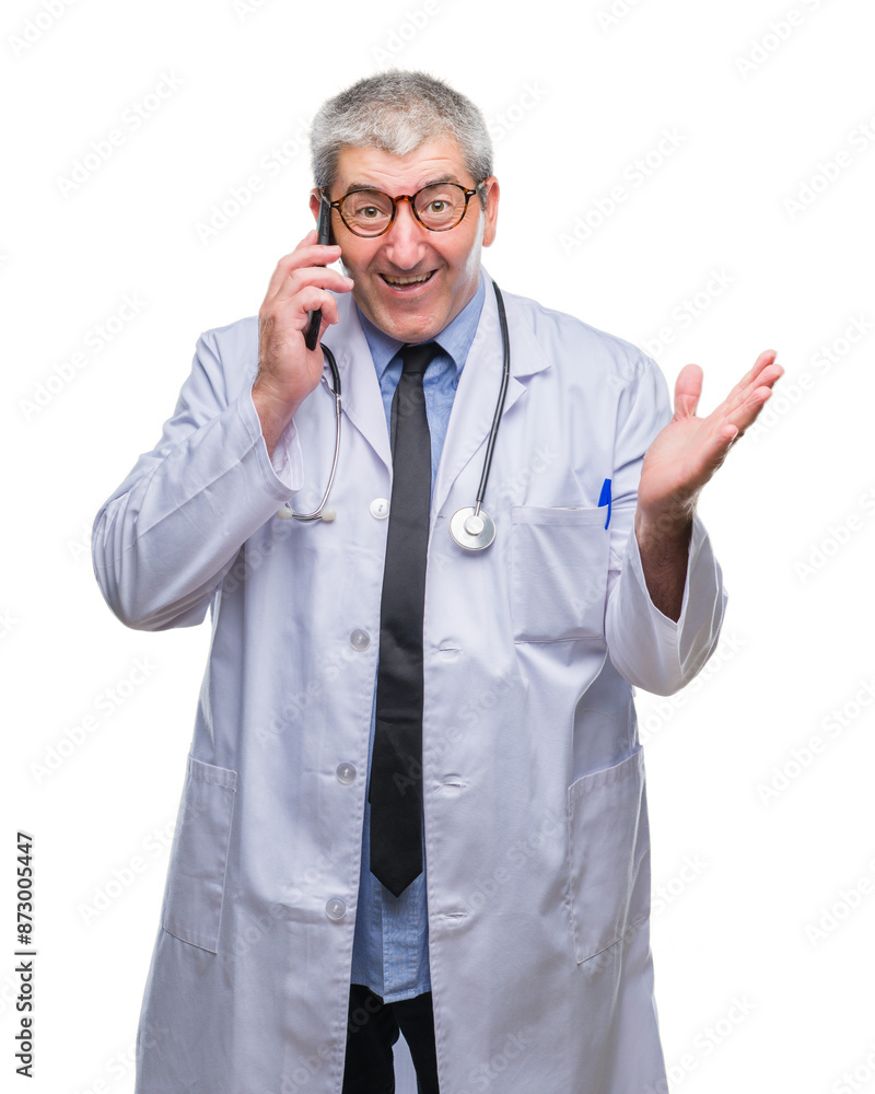 Handsome senior doctor man talking on smarpthone over isolated background very happy and excited, winner expression celebrating victory screaming with big smile and raised hands Handsome senior doctor man talking on smarpthone over isolated background very happy and excited, winner expression celebrating victory screaming with big smile and raised hands