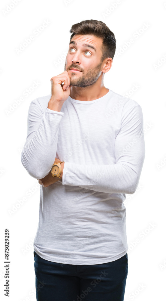 Young handsome man over isolated background with hand on chin thinking about question, pensive expression. Smiling with thoughtful face. Doubt concept. Young handsome man over isolated background with hand on chin thinking about question, pensive expression. Smiling with thoughtful face. Doubt concept.