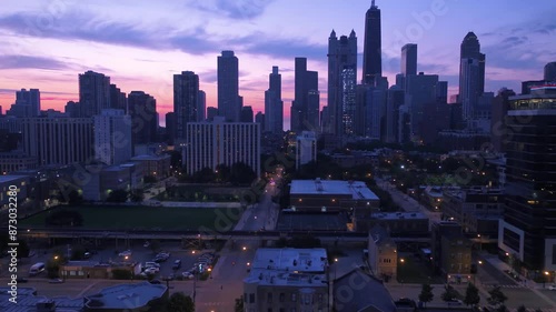 Aerial Chicago panorama above Downtown skyscrapers, Flying Сhicago street evening - Aerial View, Flying above Сhicago skyline blue at sunrise. Aerial view of the city of Сhicago dramatic photo