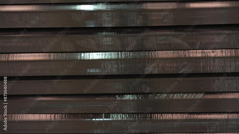 Stack of grinded metal plates Stack of grinded metal plates