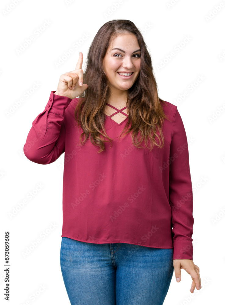 Beautiful plus size young woman over isolated background pointing finger up with successful idea. Exited and happy. Number one. Beautiful plus size young woman over isolated background pointing finger up with successful idea. Exited and happy. Number one.