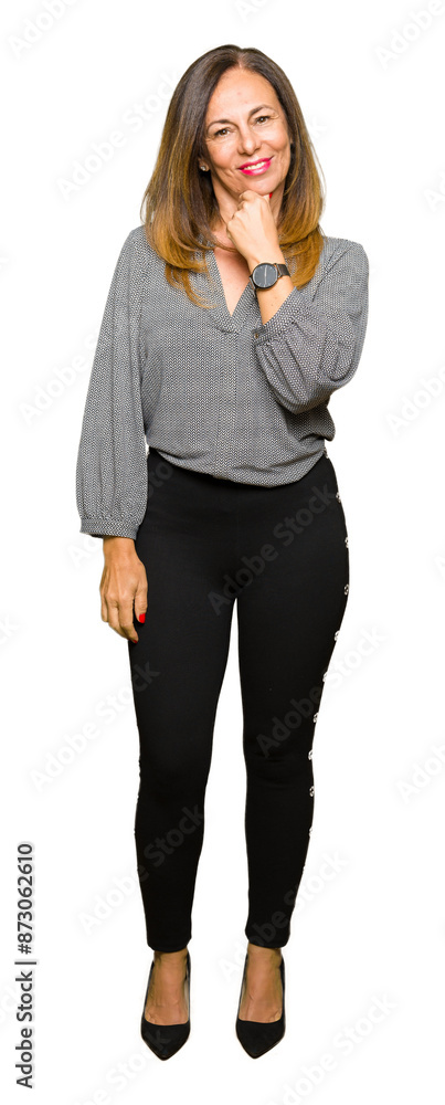 Beautiful middle age business woman looking confident at the camera with smile with crossed arms and hand raised on chin. Thinking positive. Beautiful middle age business woman looking confident at the camera with smile with crossed arms and hand raised on chin. Thinking positive.
