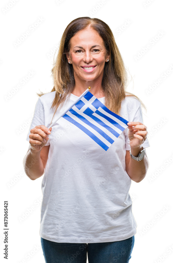 Middle age hispanic woman holding flag of Greece over isolated background with a happy face standing and smiling with a confident smile showing teeth Middle age hispanic woman holding flag of Greece over isolated background with a happy face standing and smiling with a confident smile showing teeth