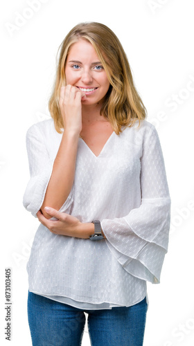 Beautiful young elegant woman over isolated background looking stressed and nervous with hands on mouth biting nails. Anxiety problem.