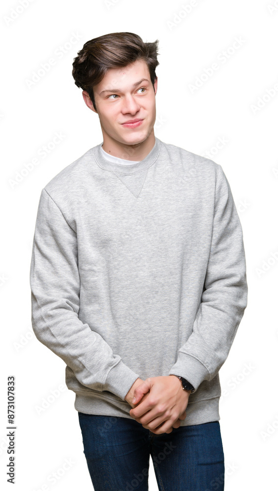 Young handsome sporty man wearing sweatshirt over isolated background smiling looking side and staring away thinking. Young handsome sporty man wearing sweatshirt over isolated background smiling looking side and staring away thinking.