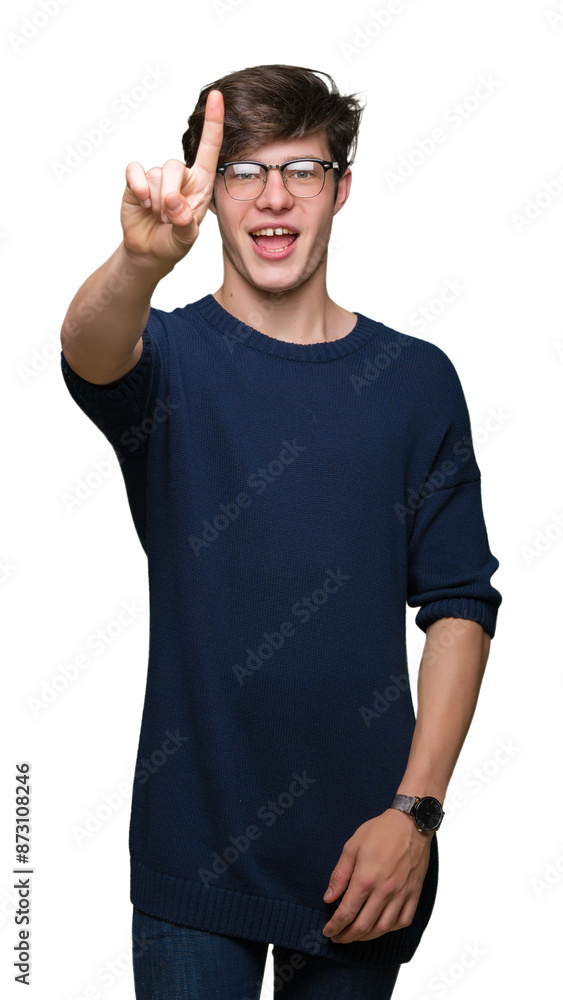 Young handsome man wearing glasses over isolated background showing and pointing up with finger number one while smiling confident and happy. Young handsome man wearing glasses over isolated background showing and pointing up with finger number one while smiling confident and happy.
