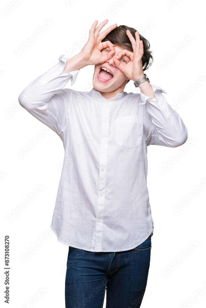 Young handsome business man over isolated background doing ok gesture like binoculars sticking tongue out, eyes looking through fingers. Crazy expression. Young handsome business man over isolated background doing ok gesture like binoculars sticking tongue out, eyes looking through fingers. Crazy expression.