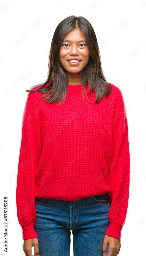 Young asian woman wearing winter sweater over isolated background with a happy and cool smile on face. Lucky person. Young asian woman wearing winter sweater over isolated background with a happy and cool smile on face. Lucky person.