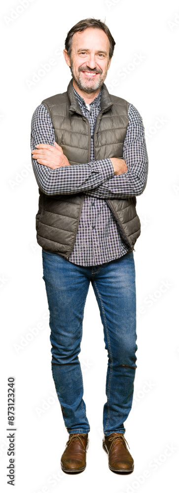 Middle age handsome man wearing winter vest happy face smiling with crossed arms looking at the camera. Positive person. Middle age handsome man wearing winter vest happy face smiling with crossed arms looking at the camera. Positive person.