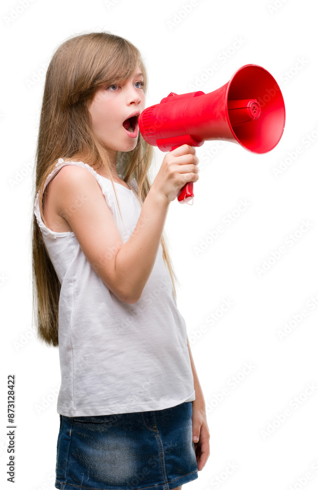 Young blonde toddler holding megaphone with a happy face standing and smiling with a confident smile showing teeth Young blonde toddler holding megaphone with a happy face standing and smiling with a confident smile showing teeth