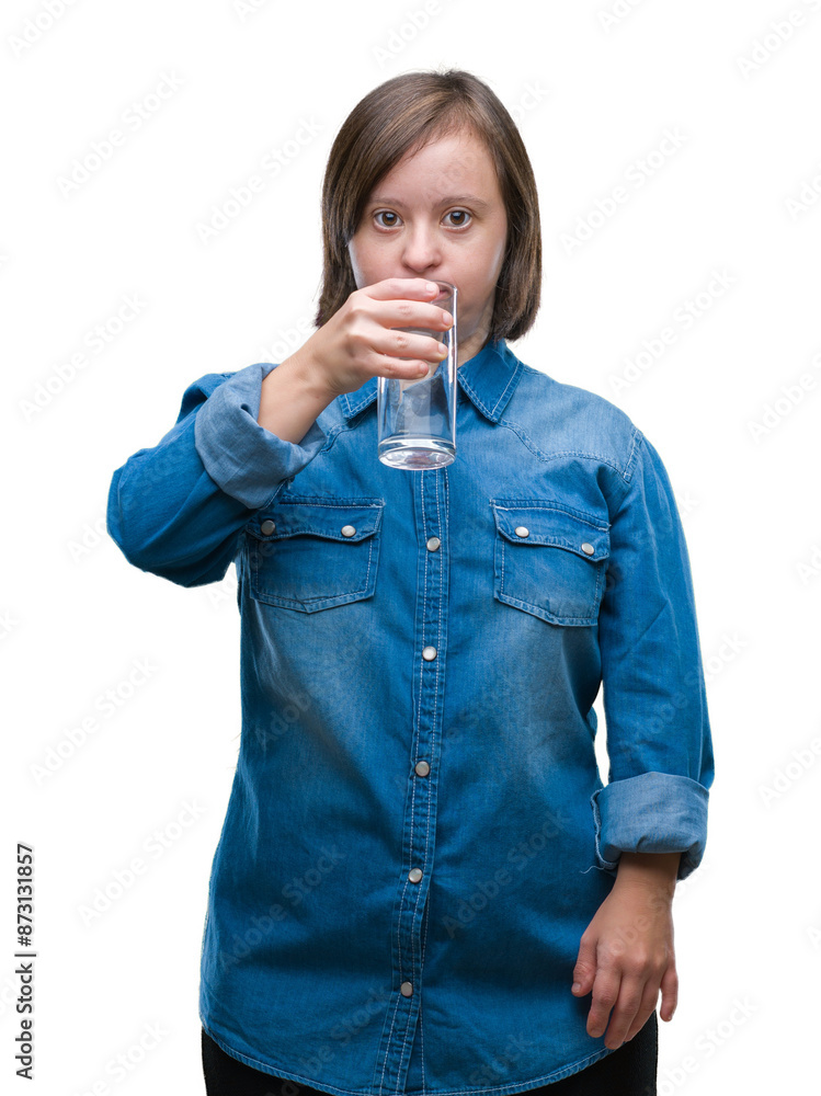 Young adult woman with down syndrome drinking water over isolated background with a confident expression on smart face thinking serious