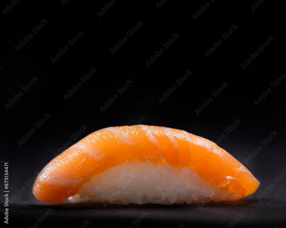 Salmon sushi, nigiri black background Salmon sushi, nigiri black background