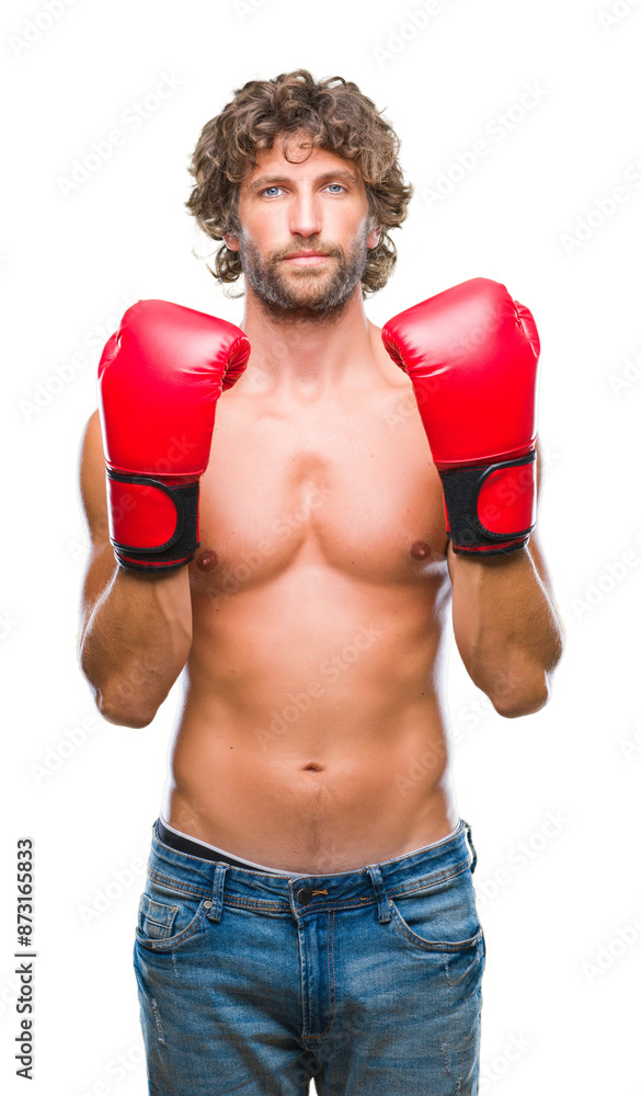 Handsome hispanic boxer man wearing boxing gloves over isolated background with serious expression on face. Simple and natural looking at the camera. Handsome hispanic boxer man wearing boxing gloves over isolated background with serious expression on face. Simple and natural looking at the camera.