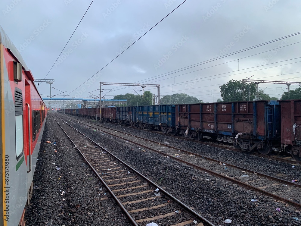 Transport cargo logistics train on the railway track Transport cargo logistics train on the railway track