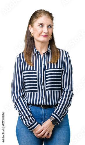 Middle age mature business woman over isolated background smiling looking side and staring away thinking.