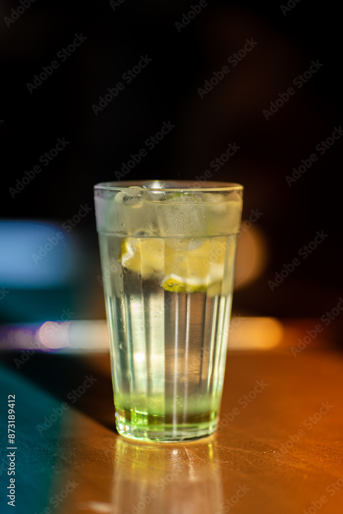glass of water on a black background glass of water on a black background