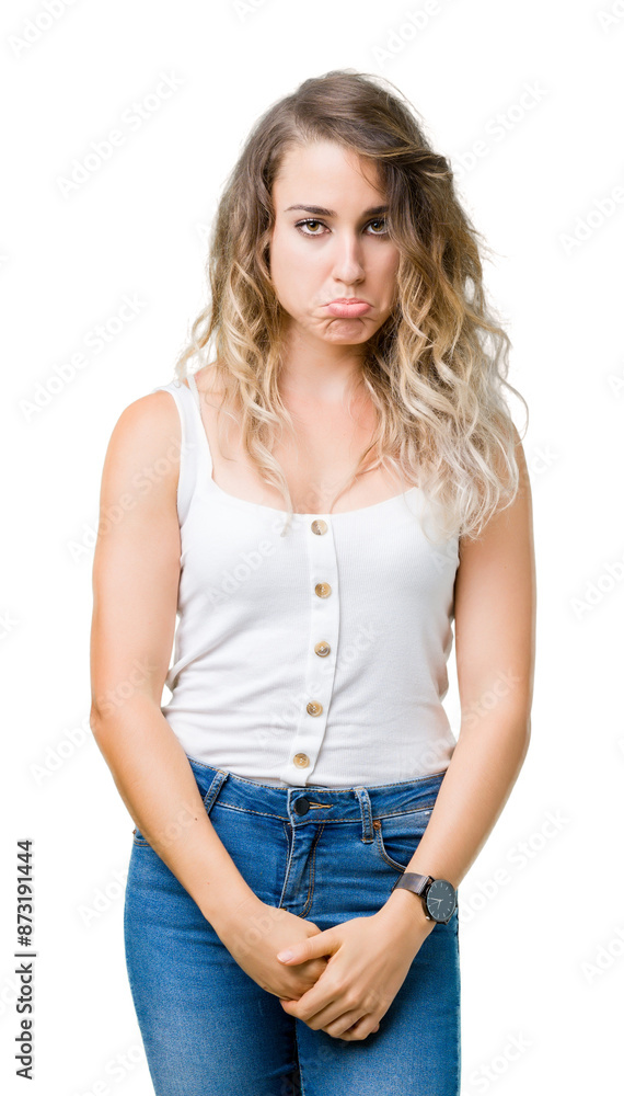 Fototapeta premium Young beautiful blonde woman over isolated background depressed and worry for distress, crying angry and afraid. Sad expression.