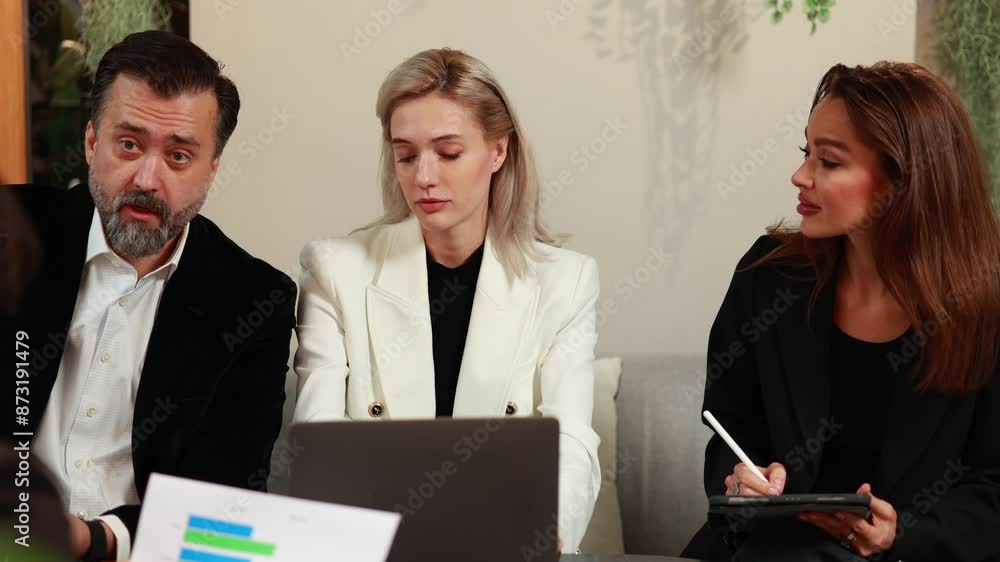 Business meeting - Group of diversity men and women sitting in conference room and smiling at meeting research plan in boardroom. Professional business people brainstorming and teamwork concept.