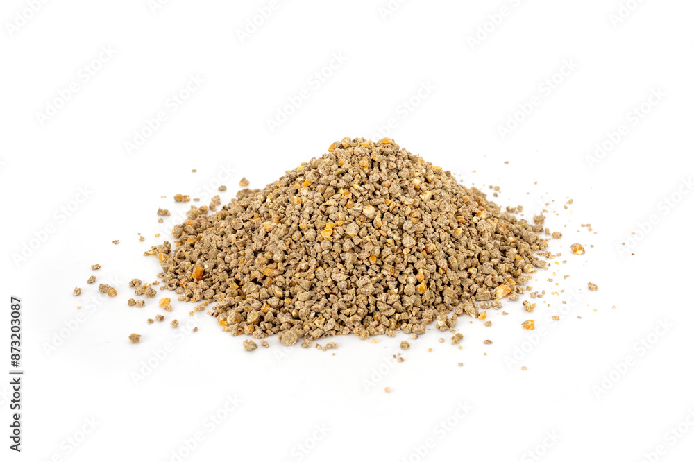 Poultry Feed for animal (Chicken). Food for young chicken. Crumble feed pile isolated on white background. Poultry Feed for animal (Chicken). Food for young chicken. Crumble feed pile isolated on white background.