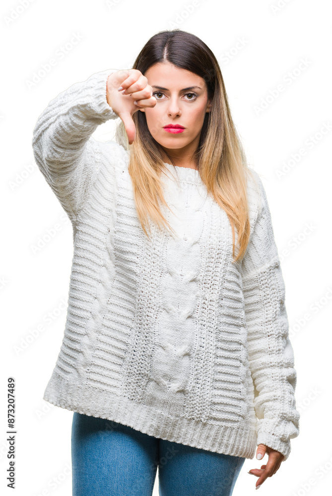 Young beautiful woman casual white sweater over isolated background looking unhappy and angry showing rejection and negative with thumbs down gesture. Bad expression. Young beautiful woman casual white sweater over isolated background looking unhappy and angry showing rejection and negative with thumbs down gesture. Bad expression.
