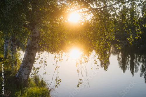 Summer sunset over the river.  Finland photo