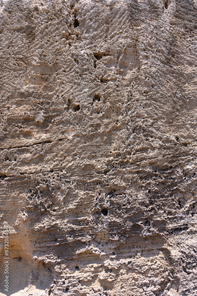 Natural cream color sandstone with cracks Natural cream color sandstone with cracks