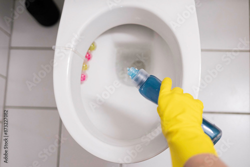 The process of washing a toilet with a cleaning product, cleaning toilets