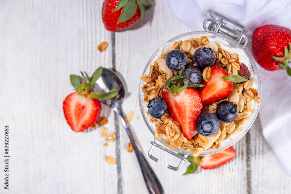 Summer berries granola breakfast layered dessert