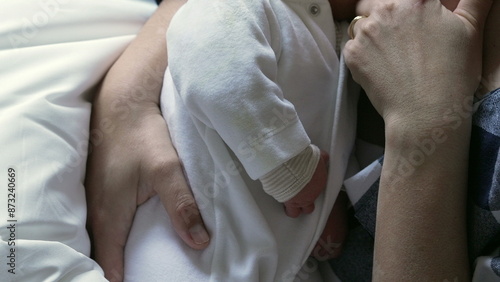 Close-up of mother breastfeeding her newborn baby, emphasizing the intimate and nurturing moment of maternal care and bonding in a calm home environment