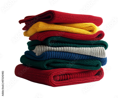 Stack of neatly folded colorful clothes on white background.. photo