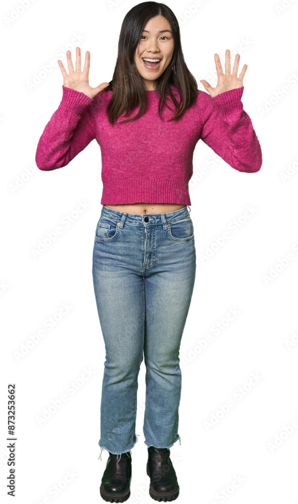 Full-body young Chinese woman receiving a pleasant surprise, excited and raising hands. Full-body young Chinese woman receiving a pleasant surprise, excited and raising hands.