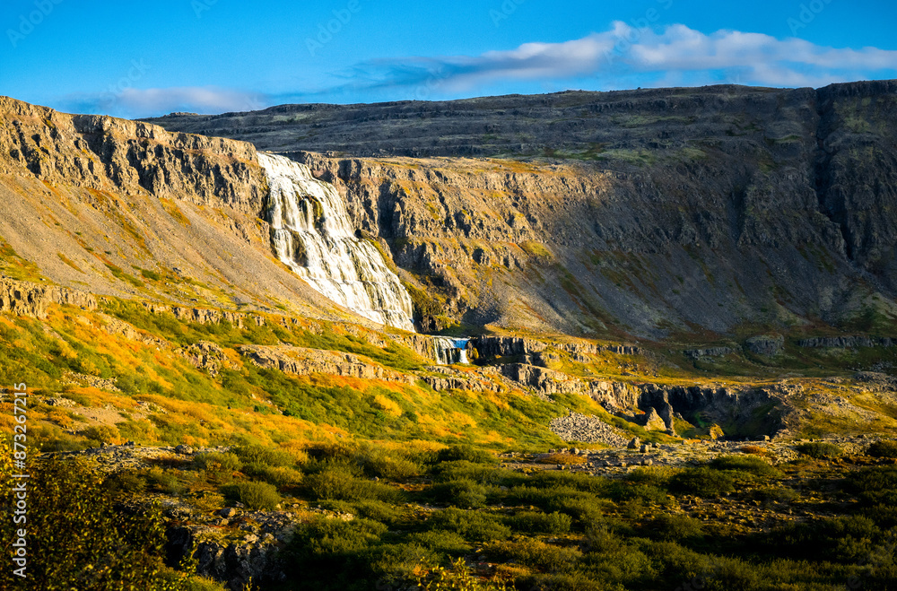 Obraz premium Landscape with waterfall in the mountains of Iceland