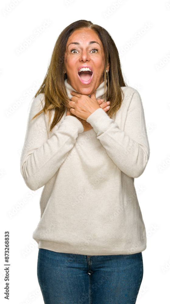 Beautiful middle age adult woman wearing winter sweater over isolated background shouting and suffocate because painful strangle. Health problem. Asphyxiate and suicide concept. Beautiful middle age adult woman wearing winter sweater over isolated background shouting and suffocate because painful strangle. Health problem. Asphyxiate and suicide concept.