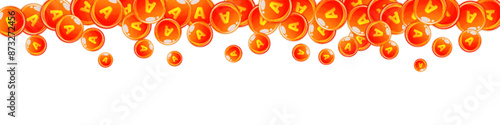 Vitamin A round capsules scattered randomly.