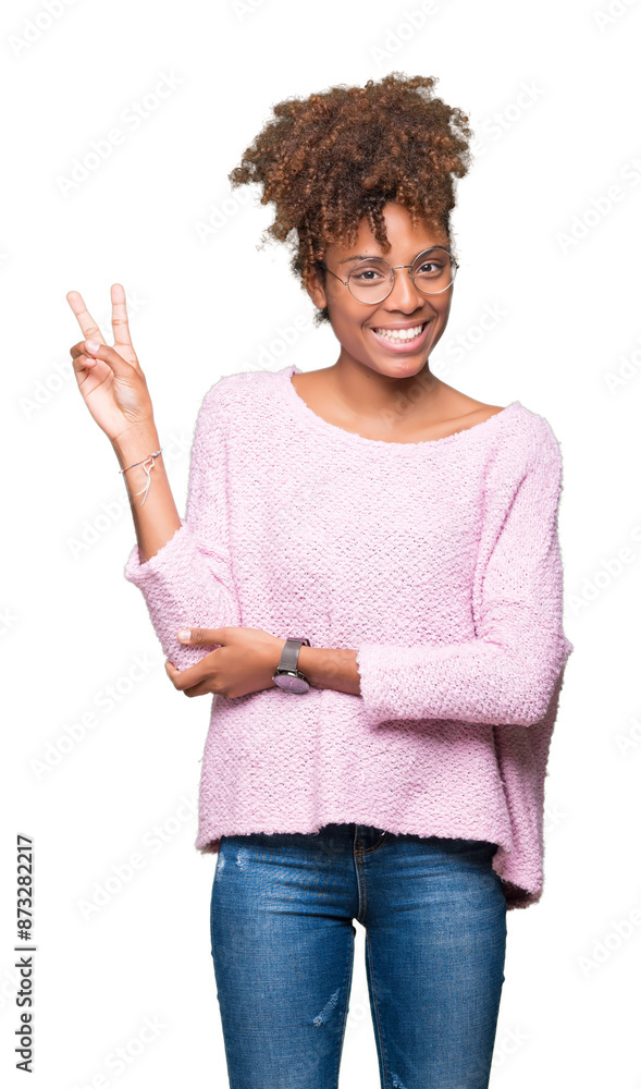 Beautiful young african american woman wearing glasses over isolated background smiling with happy face winking at the camera doing victory sign. Number two. Beautiful young african american woman wearing glasses over isolated background smiling with happy face winking at the camera doing victory sign. Number two.
