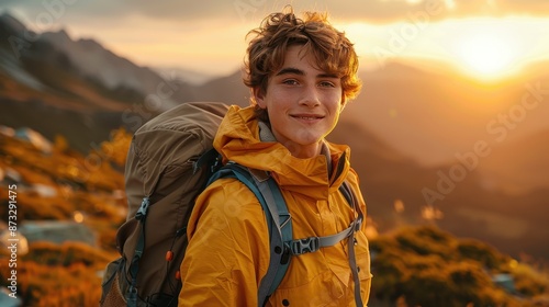 A young adventurer equipped with a backpack, hiking through mountains at sunset, personifies exploration and the allure of the wilderness in his vibrant garb. © Lens Legacy