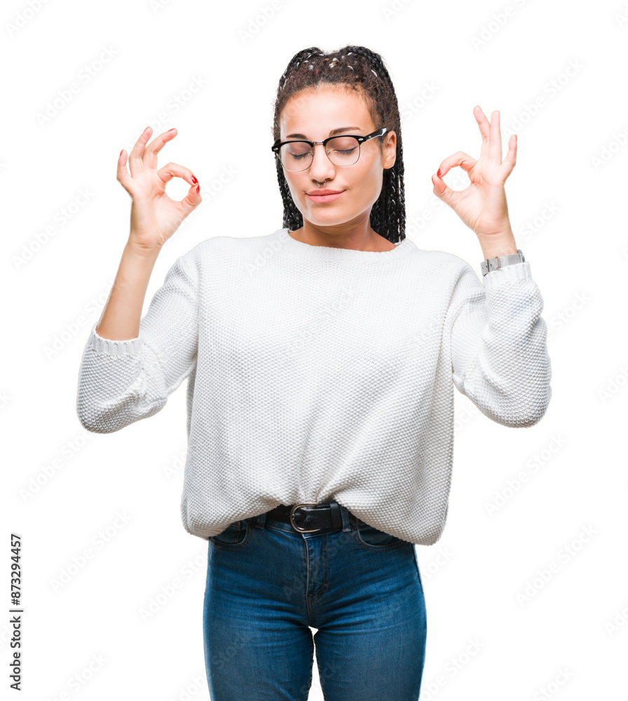 Fototapeta premium Young braided hair african american girl wearing glasses and sweater over isolated background relax and smiling with eyes closed doing meditation gesture with fingers. Yoga concept.
