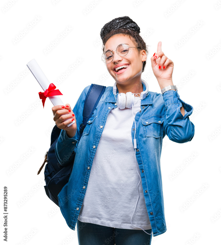 Young braided hair african american student girl holding degree over isolated background surprised with an idea or question pointing finger with happy face, number one Young braided hair african american student girl holding degree over isolated background surprised with an idea or question pointing finger with happy face, number one