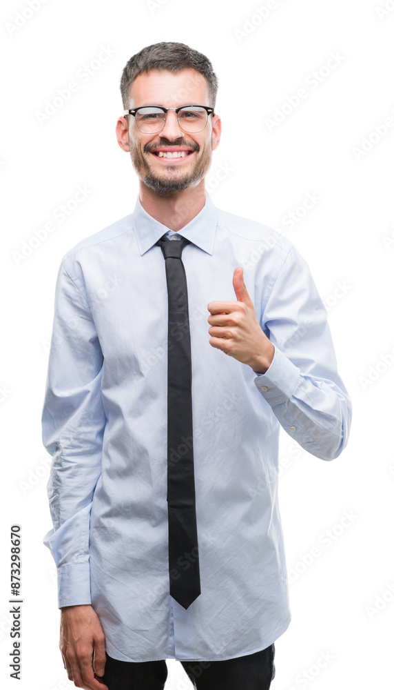 Young business man happy with big smile doing ok sign, thumb up with fingers, excellent sign Young business man happy with big smile doing ok sign, thumb up with fingers, excellent sign