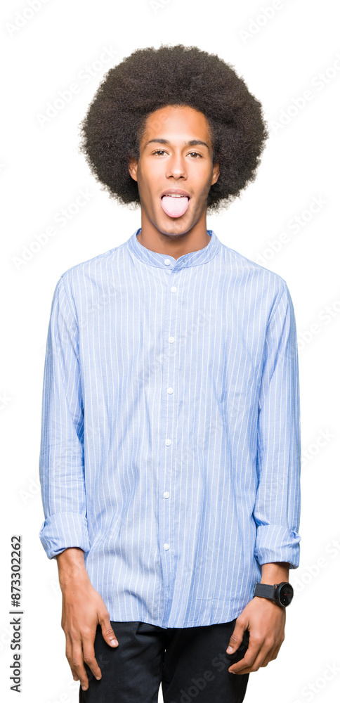Young african american man with afro hair sticking tongue out happy with funny expression. Emotion concept. Young african american man with afro hair sticking tongue out happy with funny expression. Emotion concept.