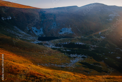 Amazing landscape with Brebeneskul lake , early morning in Carpathian mountains, Ukraine photo