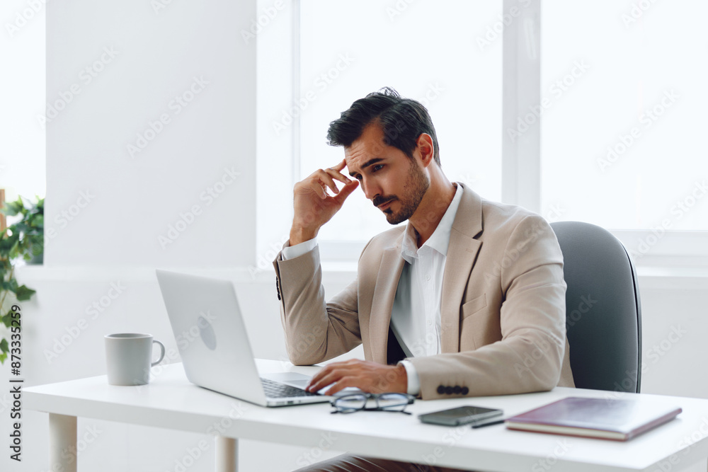 Man happy business computer executive sitting online laptop caucasian businessman worker indoors smiling office Man happy business computer executive sitting online laptop caucasian businessman worker indoors smiling office