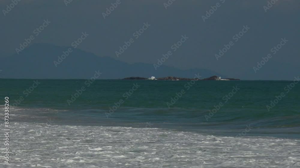 Strong waves in windy weather on the coast of Phuket Island. Strong waves in windy weather on the coast of Phuket Island.