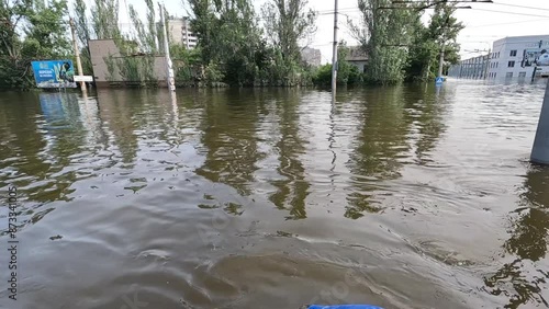 Flooding in Kherson town as a result of the explosion of a dam on the Dnipro river in city of Novaya Kakhovka. Consequences of the detonation of Kakhovka Hydroelectric Power Station. War in Ukraine photo