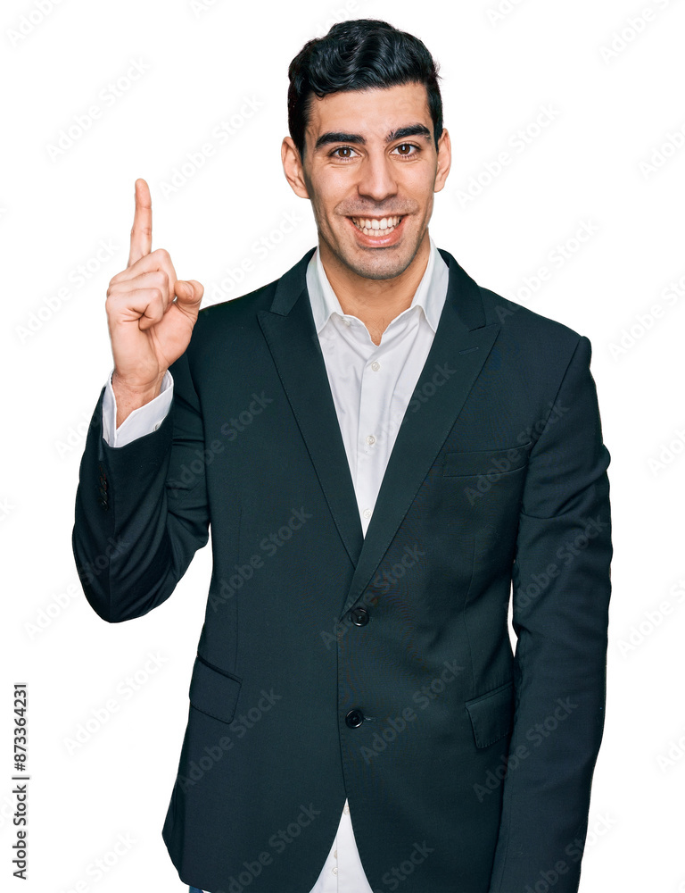 Handsome hispanic man wearing business clothes showing and pointing up with finger number one while smiling confident and happy. Handsome hispanic man wearing business clothes showing and pointing up with finger number one while smiling confident and happy.