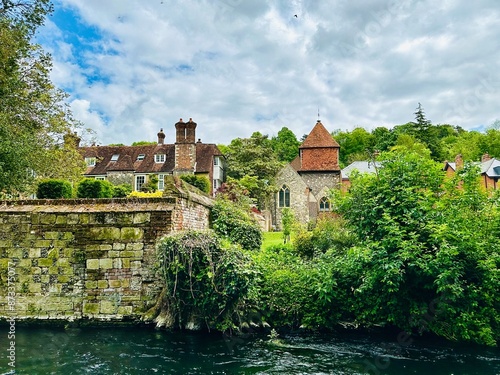 Riverside resident buildings along River Itchen in Winchester, UK