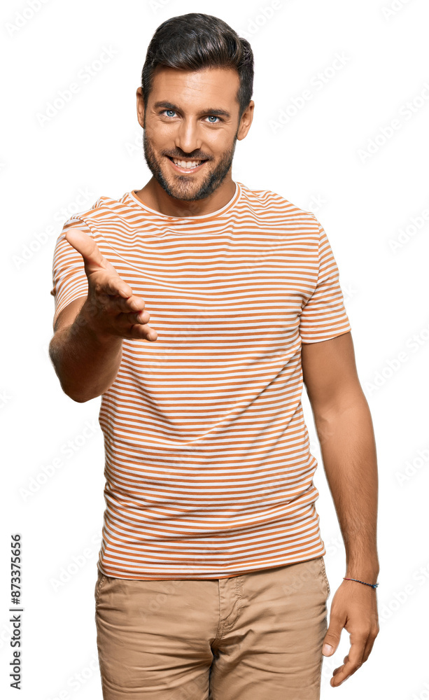 Handsome hispanic man wearing casual clothes smiling cheerful offering palm hand giving assistance and acceptance. Handsome hispanic man wearing casual clothes smiling cheerful offering palm hand giving assistance and acceptance.