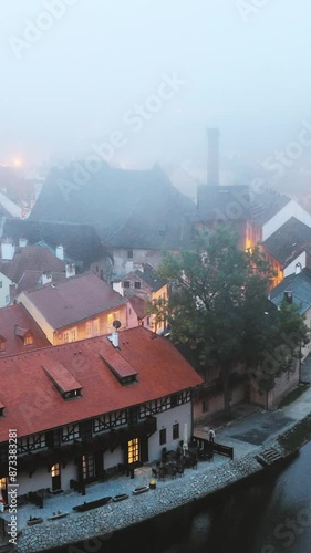 Cesky Krumlov, Czech Republic. Castle In Misty Fog In Autumn Mrning. UNESCO World Heritage Site photo